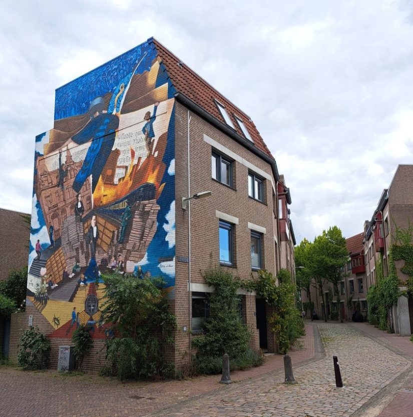 Muurschildering herinnering Universiteitsbibliotheek (augustus 2025)